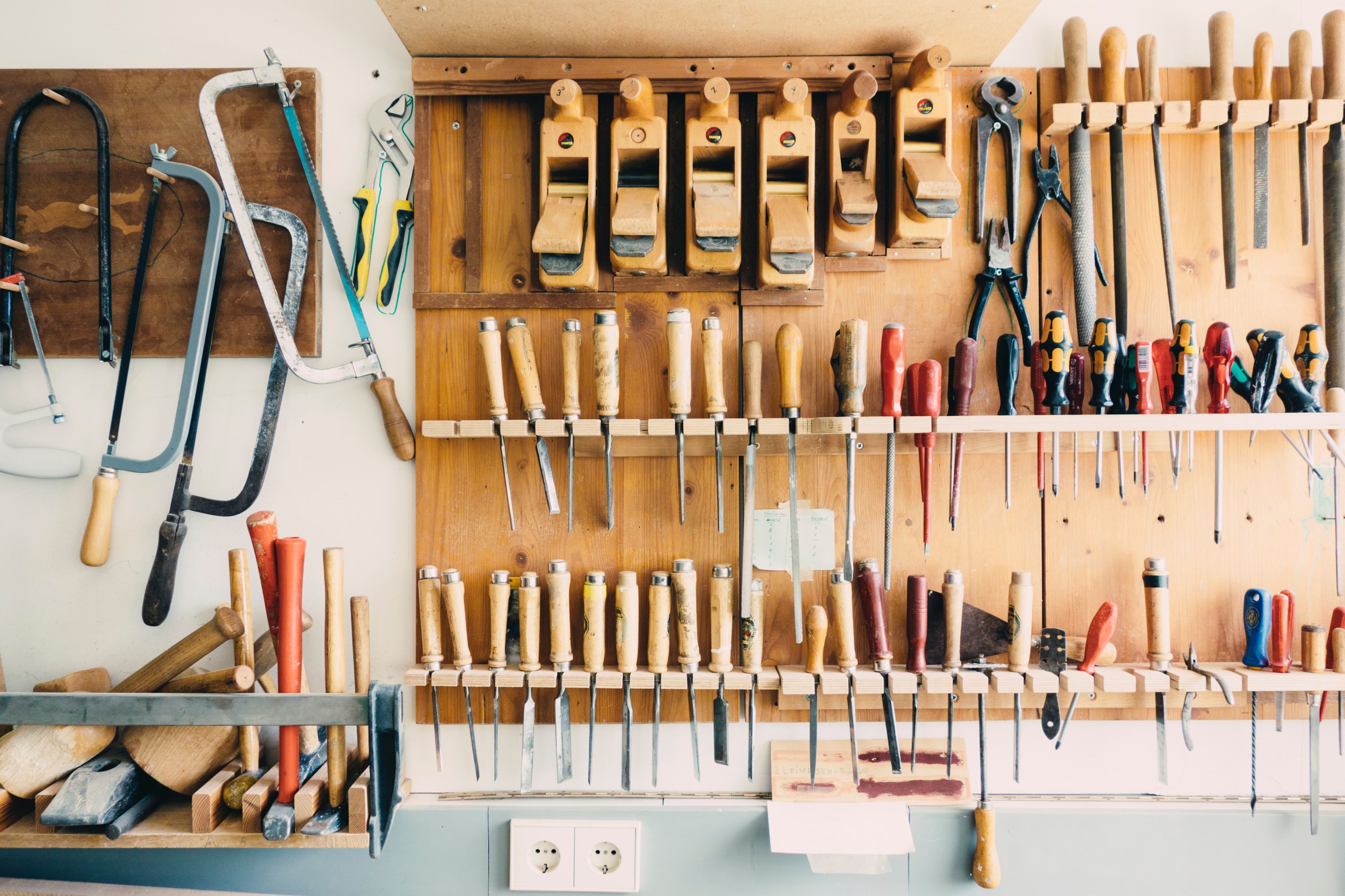 Woodworking tools and timber in a workshop